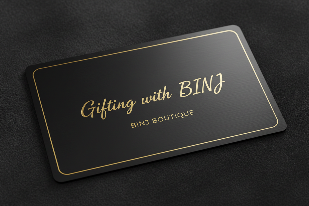 Create a black gift card that says “Gifting with BINJ”